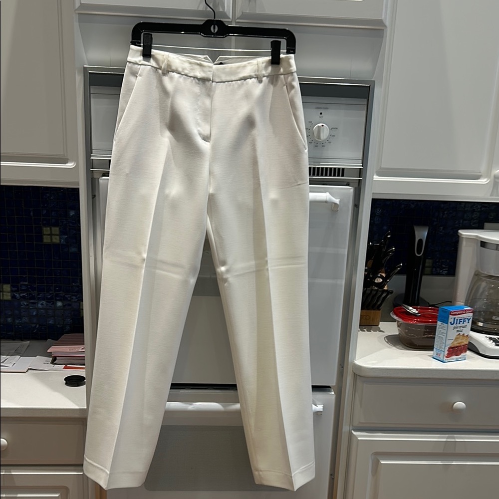 BCBG Maxazria size 2 cream trousers.